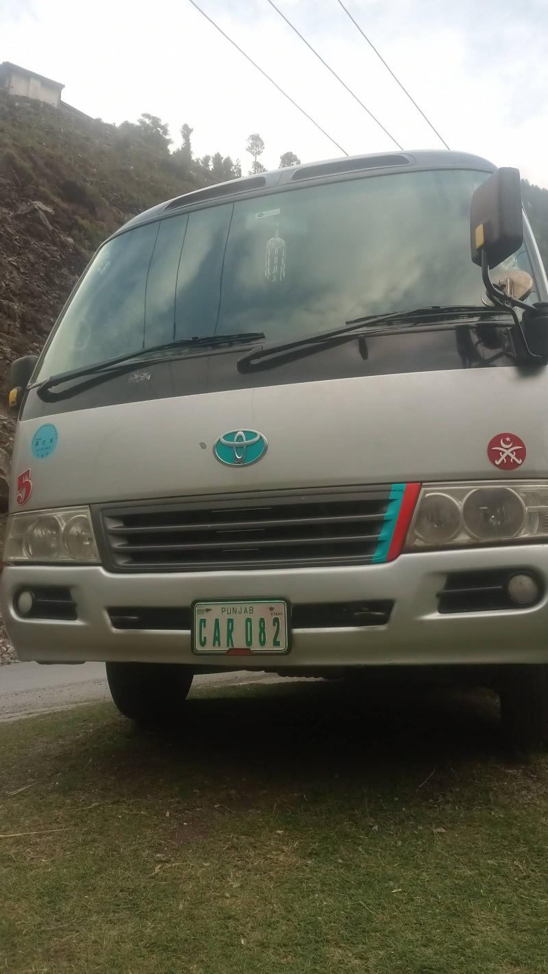 Toyota 4C Coaster Saloon 28 seats